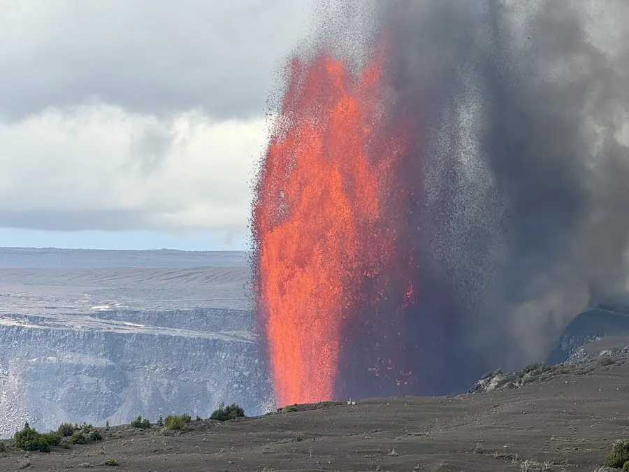 A towering lava fountain erupting from Kīlauea